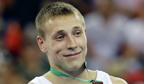 Денис Аблязин с золотой медалью чемпионате мира по спортивной гимнастике за победу в вольных упражнениях